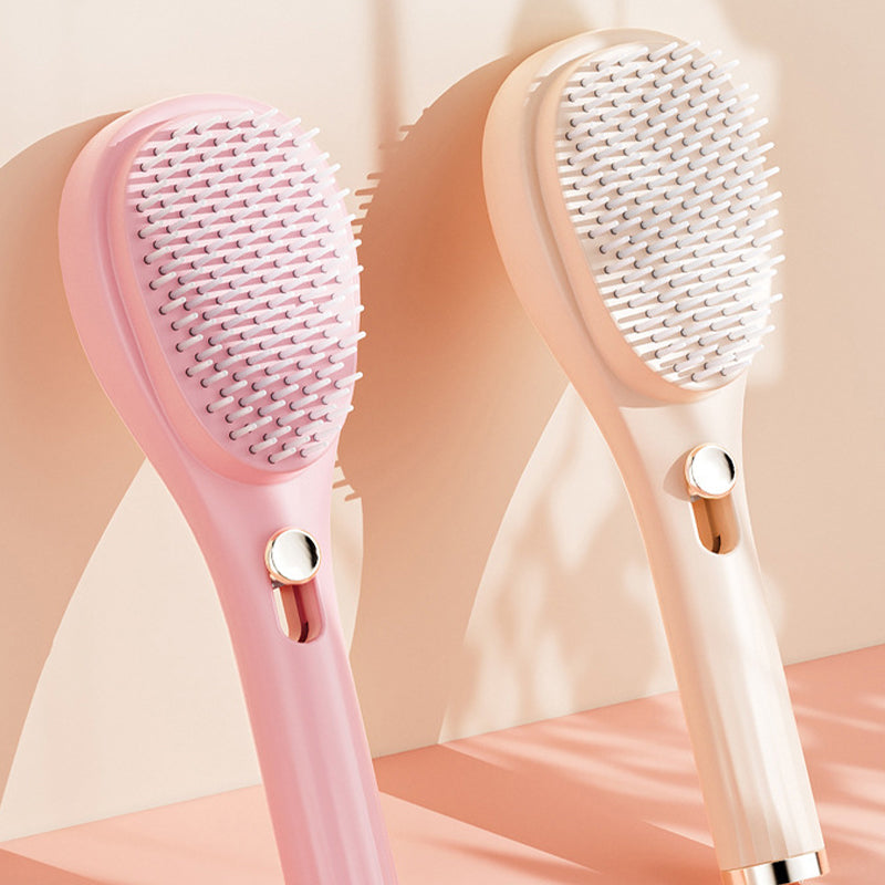 Masážní hřeben na pokožku hlavy se zasouvacími štětinami